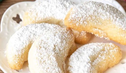 Divine sweets with almonds and vanilla on a decorative plate.