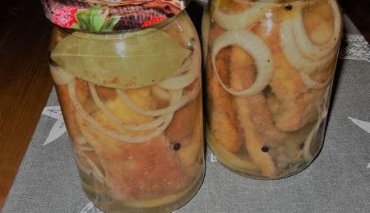 Baked carp in vinegar marinade with onions