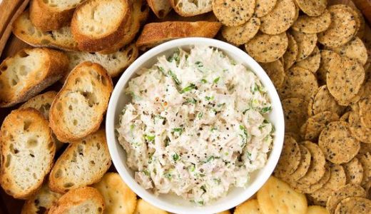Crunchy crackers stacked around a delicious celery spread.