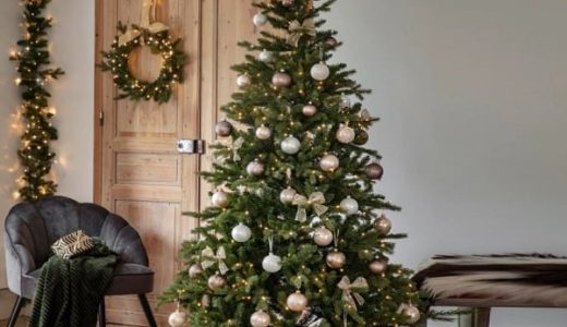 Christmas decorated pine tree in a stand