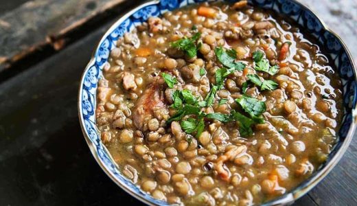 Lentil soup with sausage in a bowl