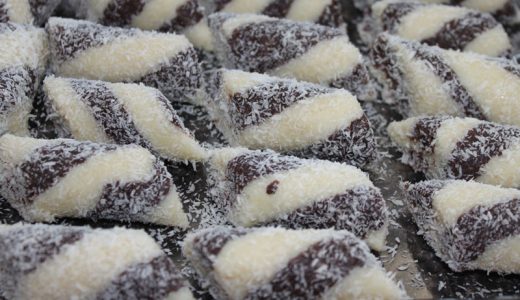 Gluten-free coconut bars dipped in chocolate