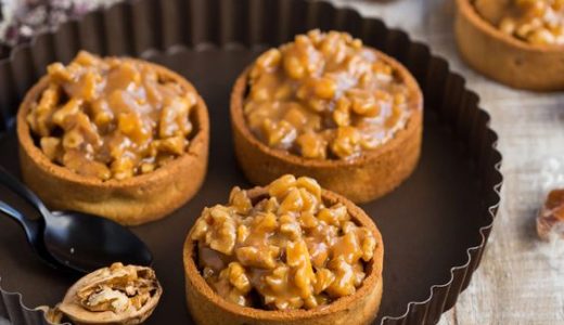 Sweet cupcakes full of nuts with caramel.