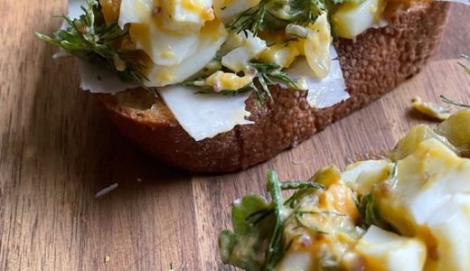 Three toasted sandwiches in a soft French-style spread.