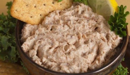Bowl with fish fillet spread.