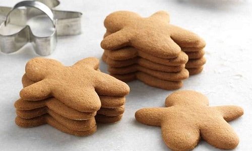 Brown gingerbread figures in the shape of gluten-free flour.