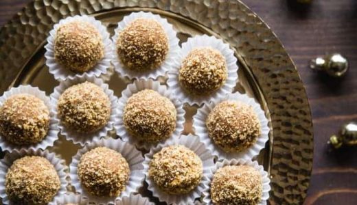 Christmas balls made of honey, caramel salk and walnuts in baskets.