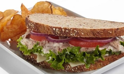 Sandwich with tuna-horseradish spread and salad.