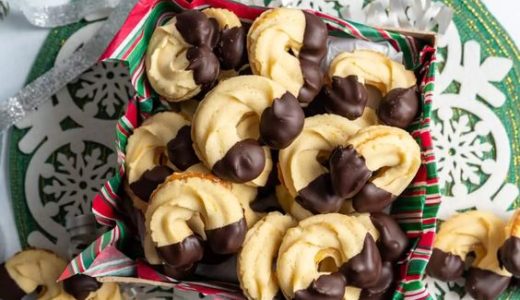 Beautifully decorated candies with nuts and dipped in chocolate.