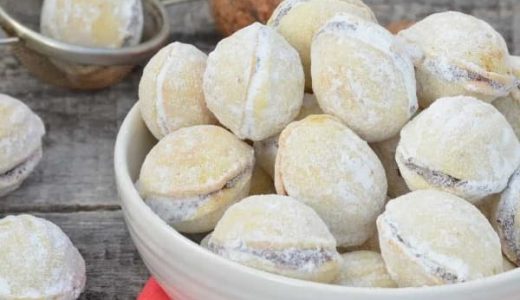 Nuts with the taste of vanilla and oranges filled with hazelnut mascarpone cream in a bowl.