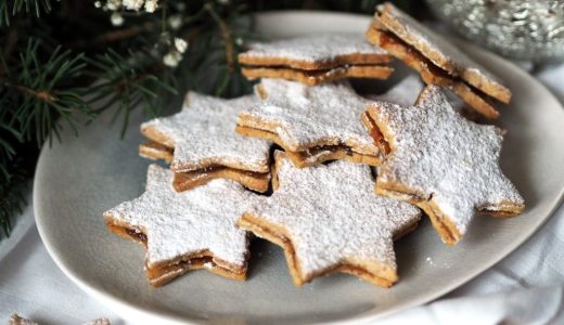 Star-shaped poppy candy sprinkled with sugar on a plate.