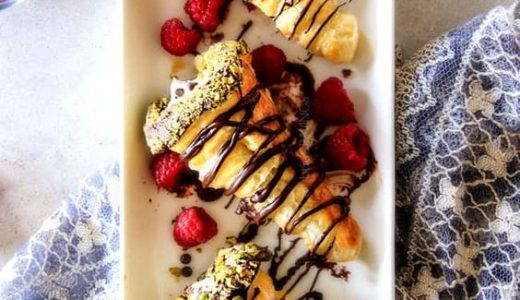 Fluffy short pastry tubes filled with cream and raspberries.