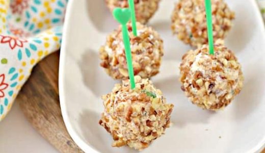 Five cheese balls wrapped in bacon.