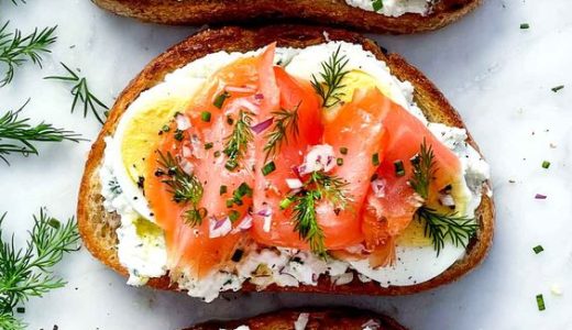 Toasted sandwich with cottage cheese base and salmon.