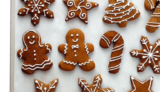 Soft Christmas gingerbread cookies with decorations on the tin