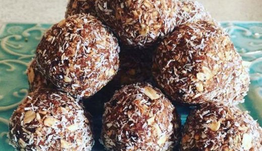 Unbaked oatmeal balls arranged in a pyramid