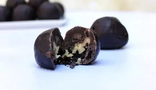 Balls made of chocolate, condensed milk and chocolate wafers filled with walnuts.
