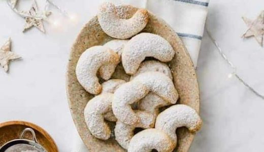 A sweet Christmas snack in the form of almond rolls.