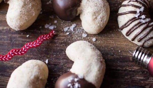 Vanilla rolls with roasted cashews decorated with chocolate.