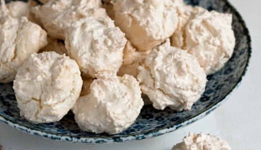 Meringue with coconut on a plate.